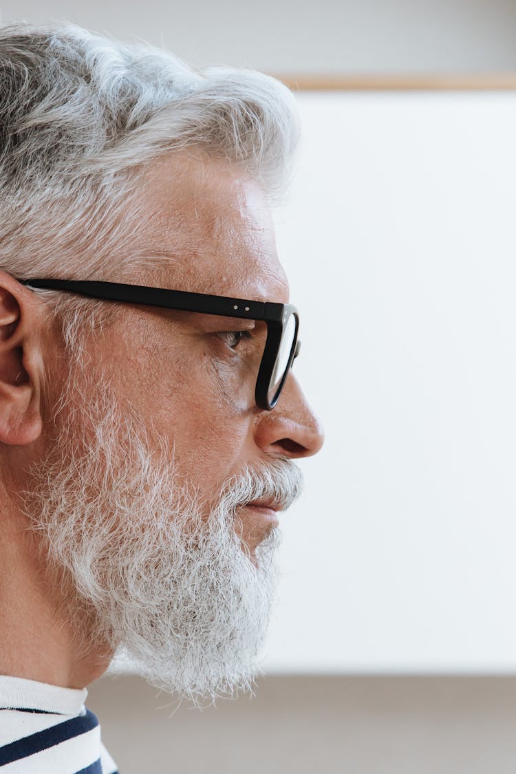 A Side View Of A Profile Of A Senior Adult Male 