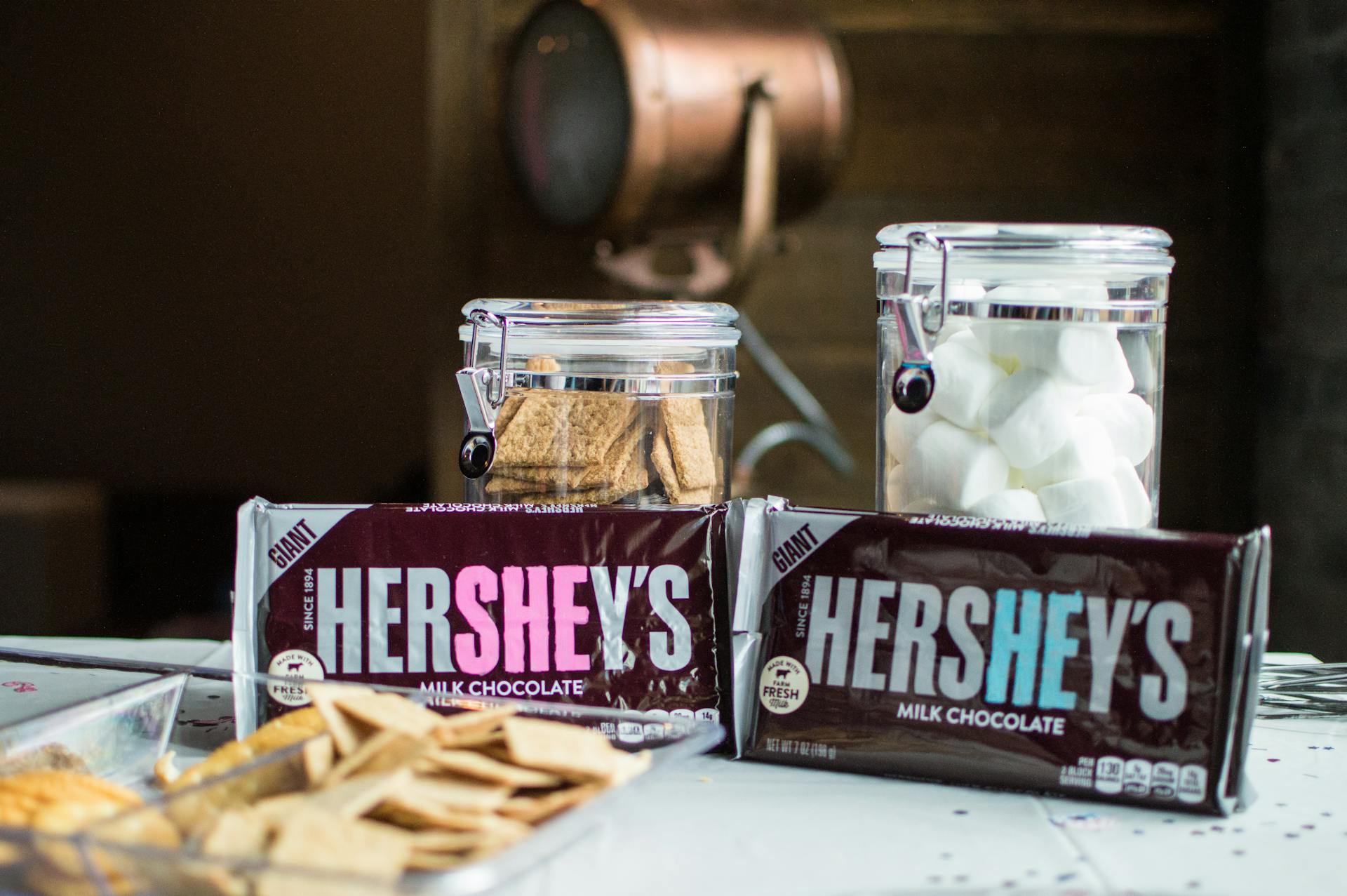 Close-up Photo of Hershey's Bars Near Jars