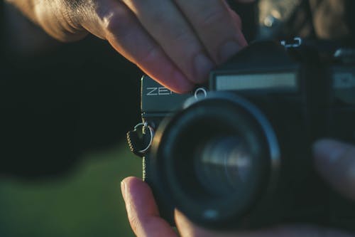 
A Close-Up Shot of a Person Using a Camera