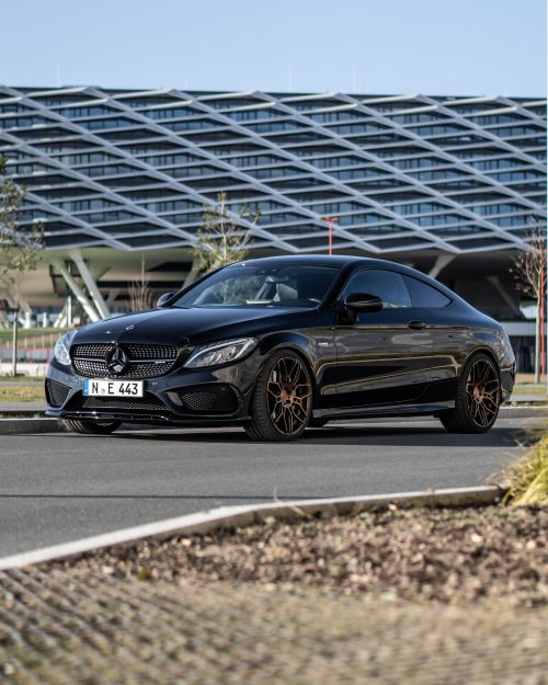 Free Stylish black Mercedes Benz parked in front of modern architecture in Nürnberg, Germany. Stock Photo