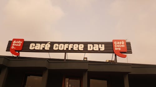 Free Photo of Cafe Coffee Day Sign Stock Photo