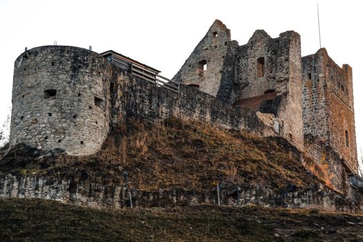 Explore the historic medieval castle ruins on a hill in Sulzberg, Germany.