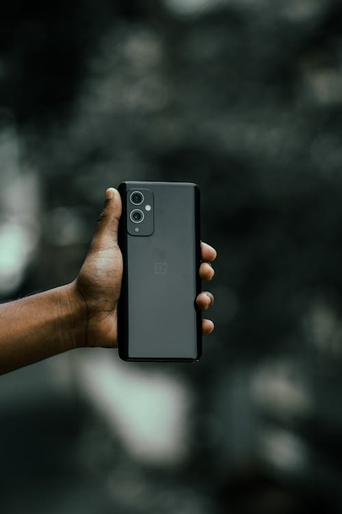 A Person Holding Black Smartphone
