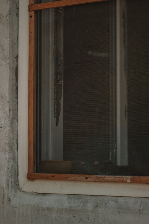 Close-up of a Window with a Wooden Frame 