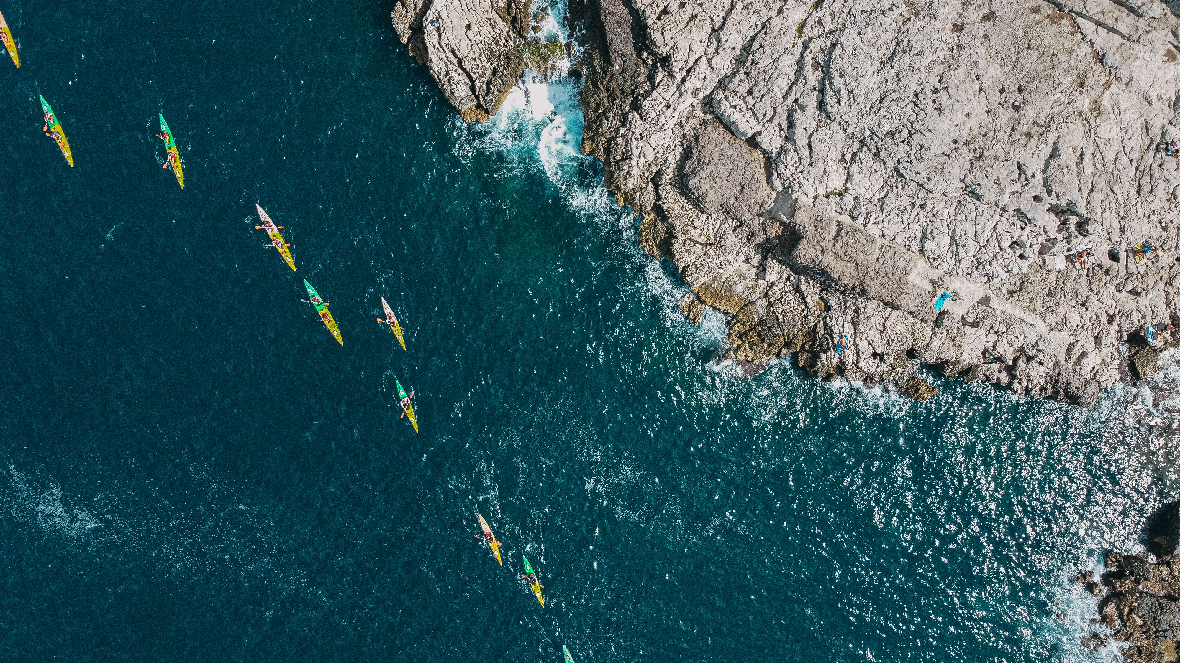 Top View Shot of People Kayaking on the Sea · Free Stock Photo