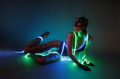Free Photo of a Woman in Black Lingerie Posing with Led Lights Stock Photo