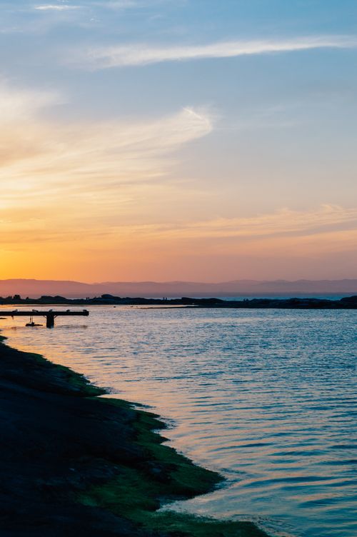 Free Breathtaking sunset reflecting on the Caspian Sea with vibrant sky and calm waters. Stock Photo
