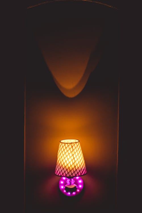 Photo of Yellow and Pink Table Lamp Turned on