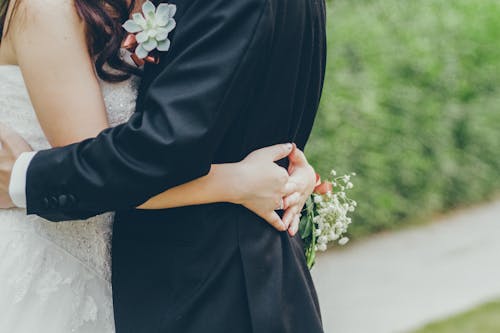 Free Photo of Bride and GroomHugging Stock Photo
