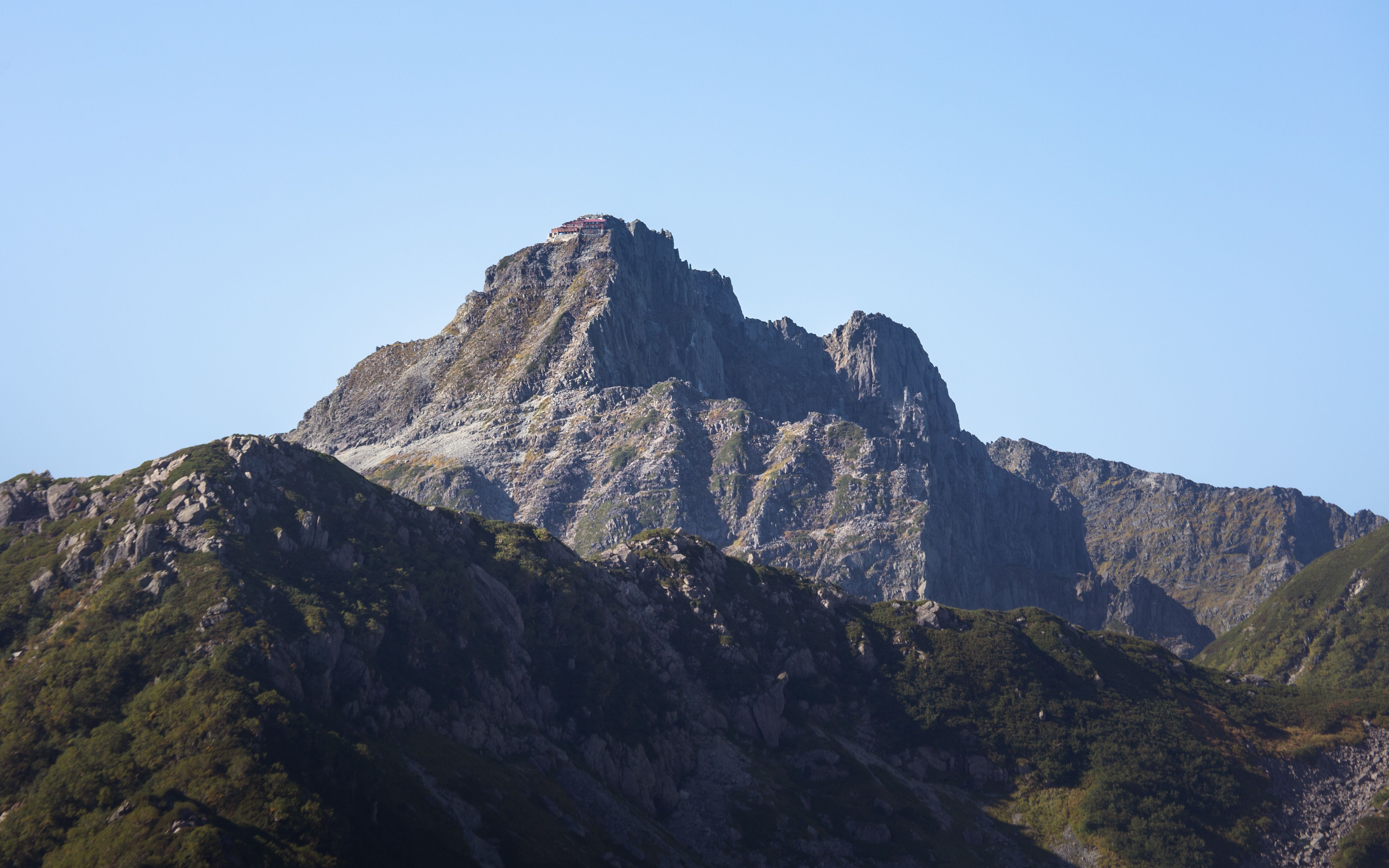 A Rocky Mountain Under the Blue Sky · Free Stock Photo