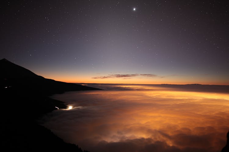 View Of A Sunset In Mountains