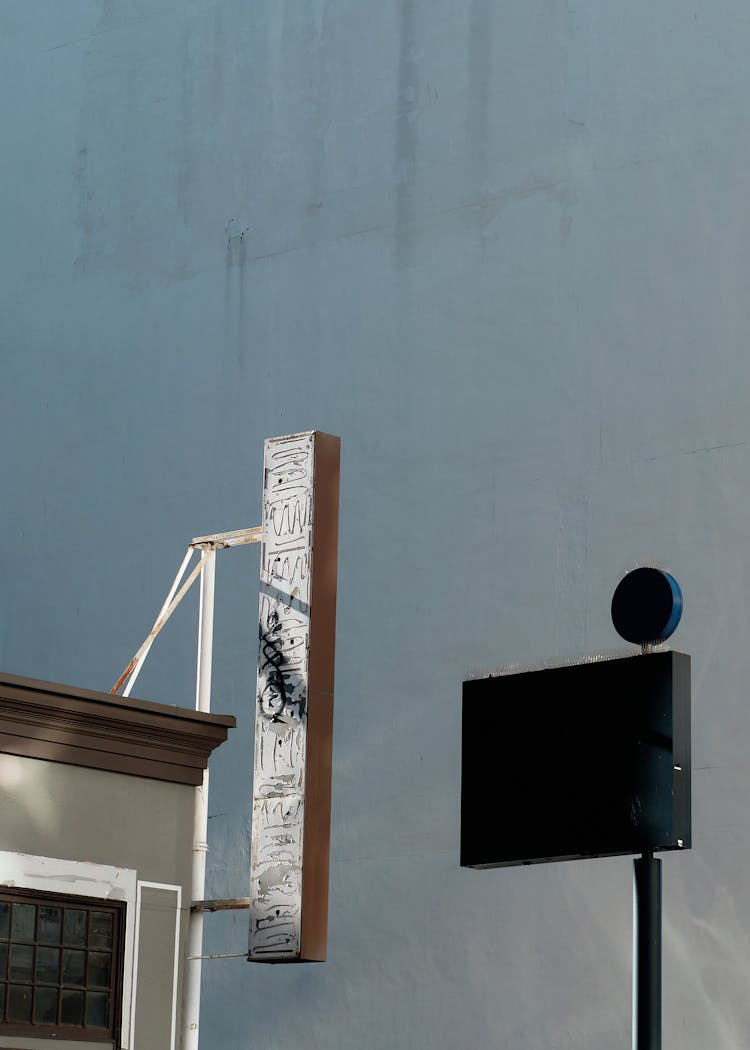 Street Sign And The Building Corner