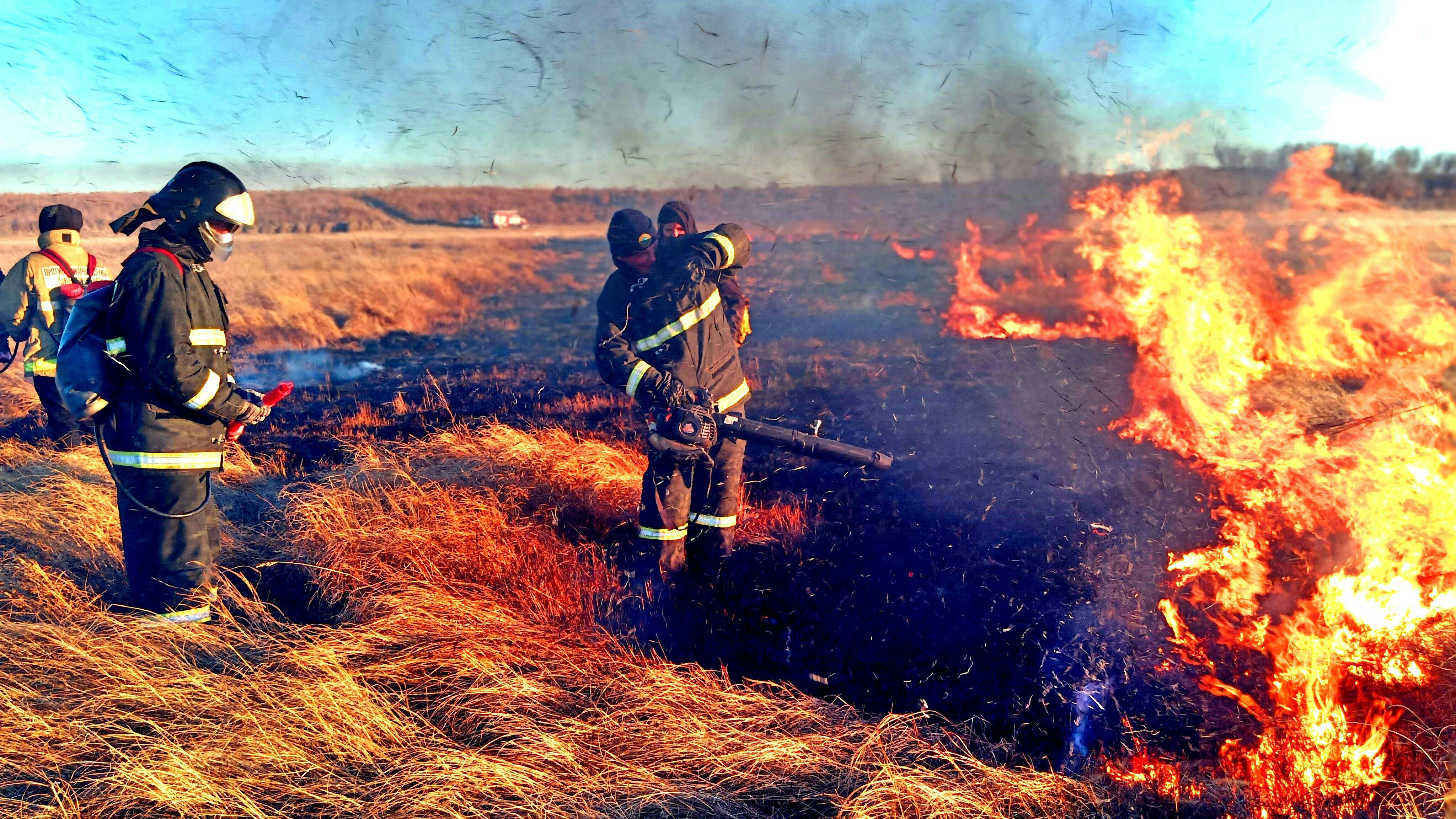 firefighters putting out a fire