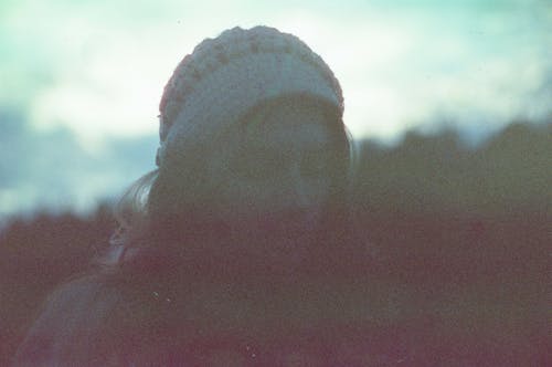 A Woman Wearing Knitted Bonnet