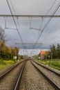 Railroad Under Cloudy Sky