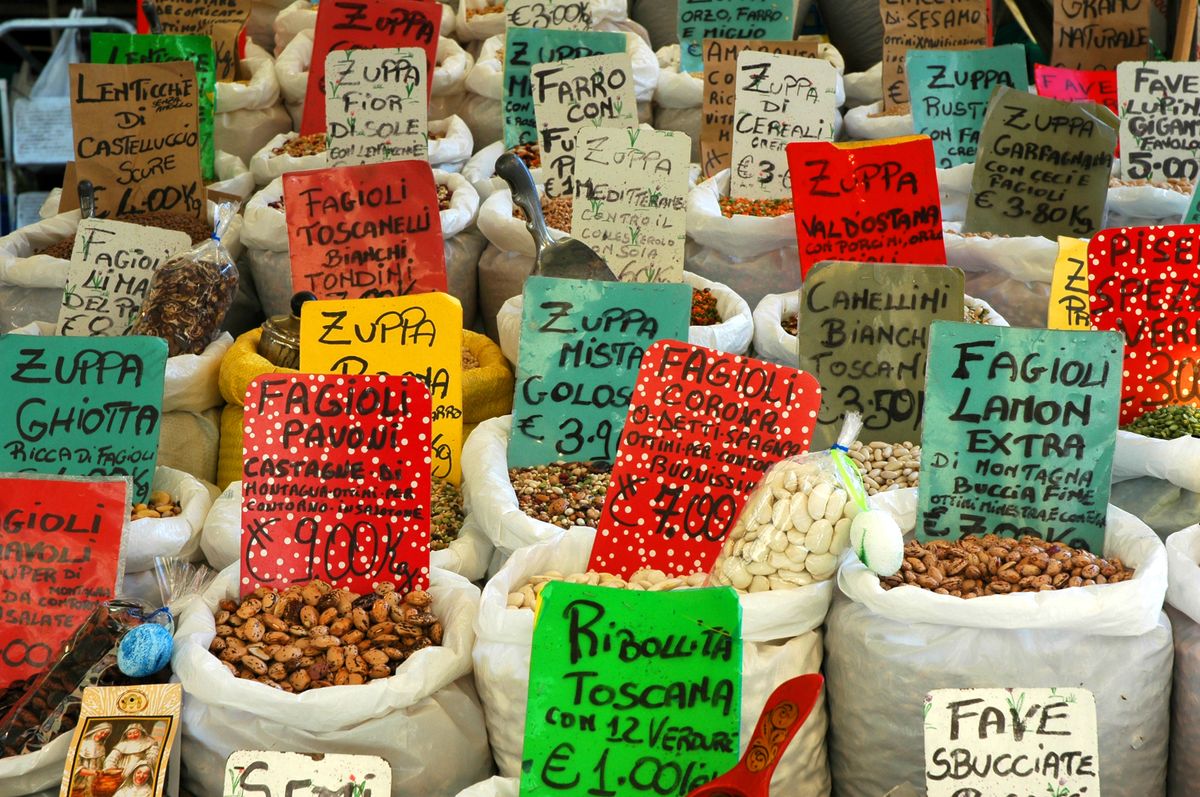 Assorted dried beans, lentils and pulses in market sacks — key fibre sources for vegan gut health