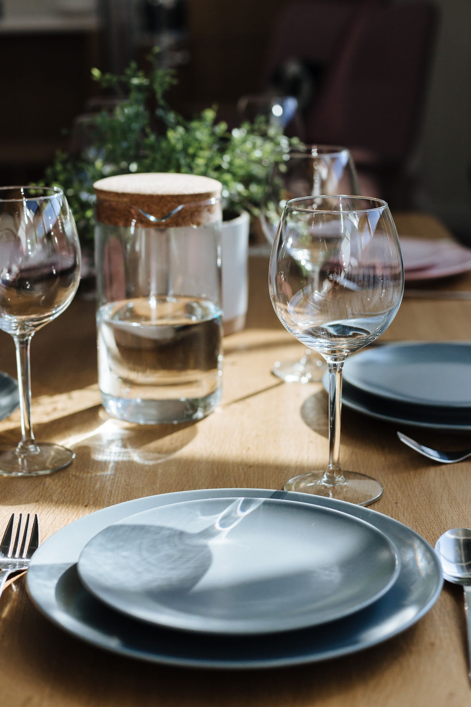 Elegant table setting with dinnerware flatware and glassware