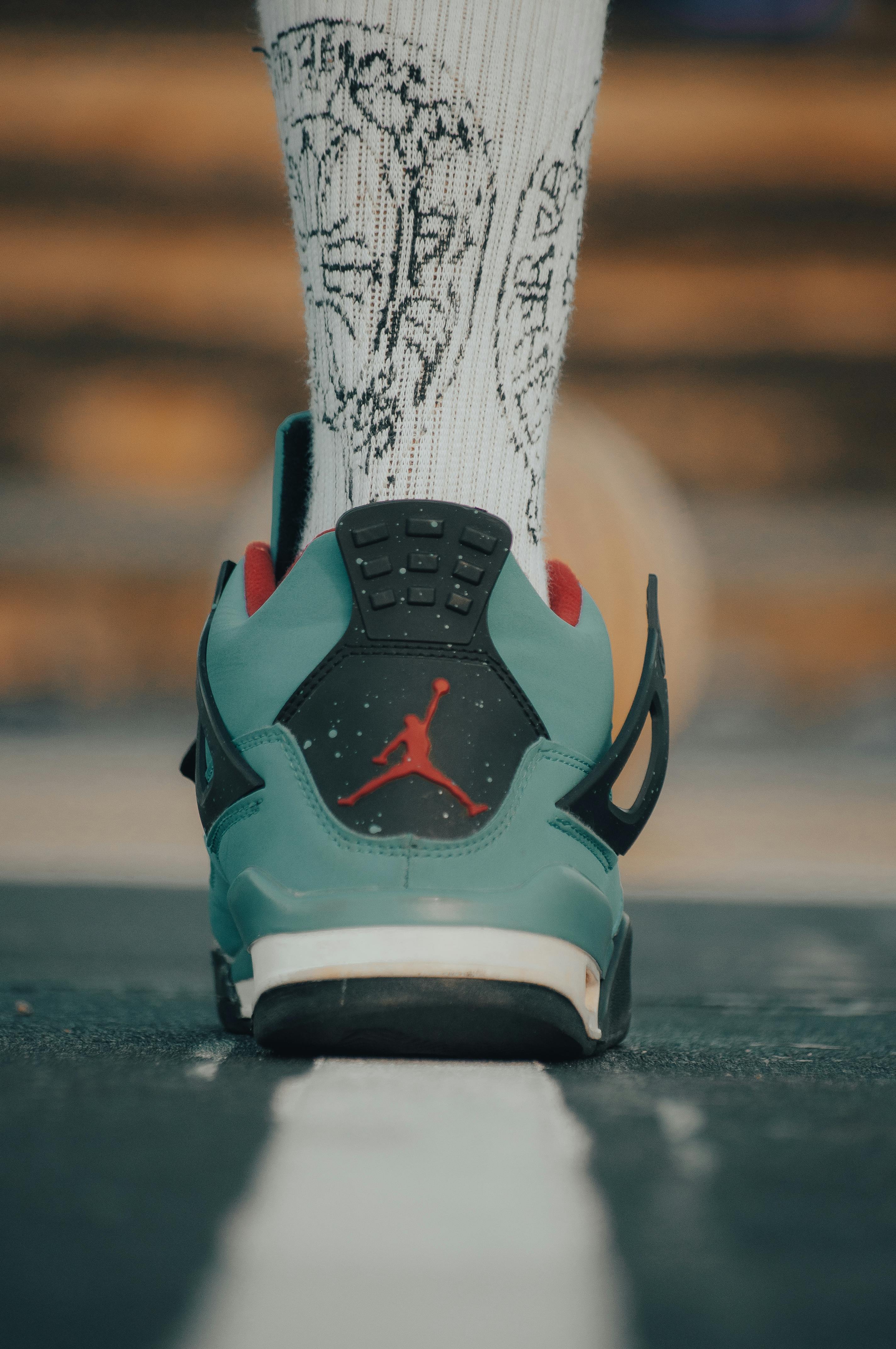 blue and white nike trainers