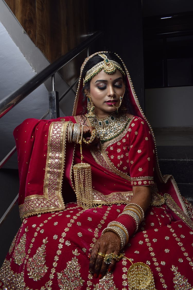 Pretty Woman In Red Saree Dress