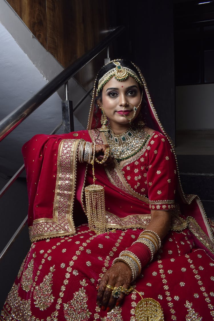 Pretty Woman In Red Saree Dress