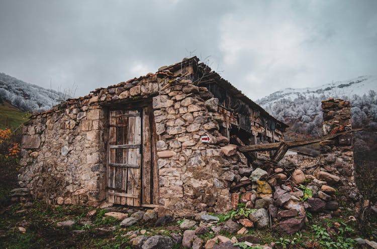 Ruins Of Stone House In Mountains