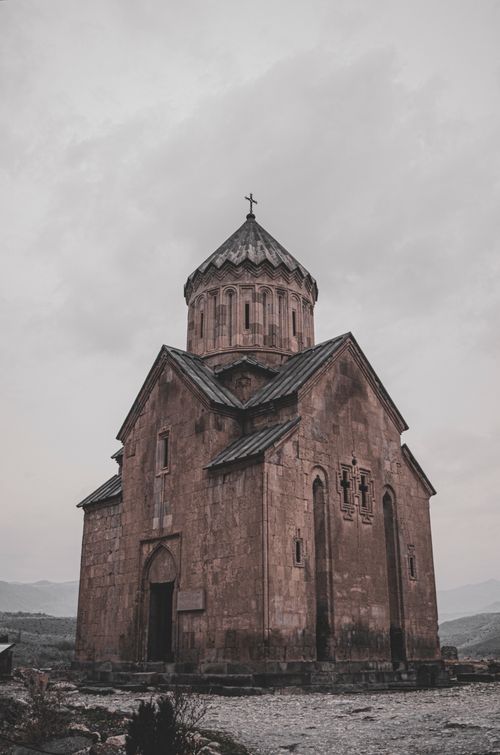 Free A historical Armenian church showcasing architectural design against a moody sky in Artsakh. Stock Photo