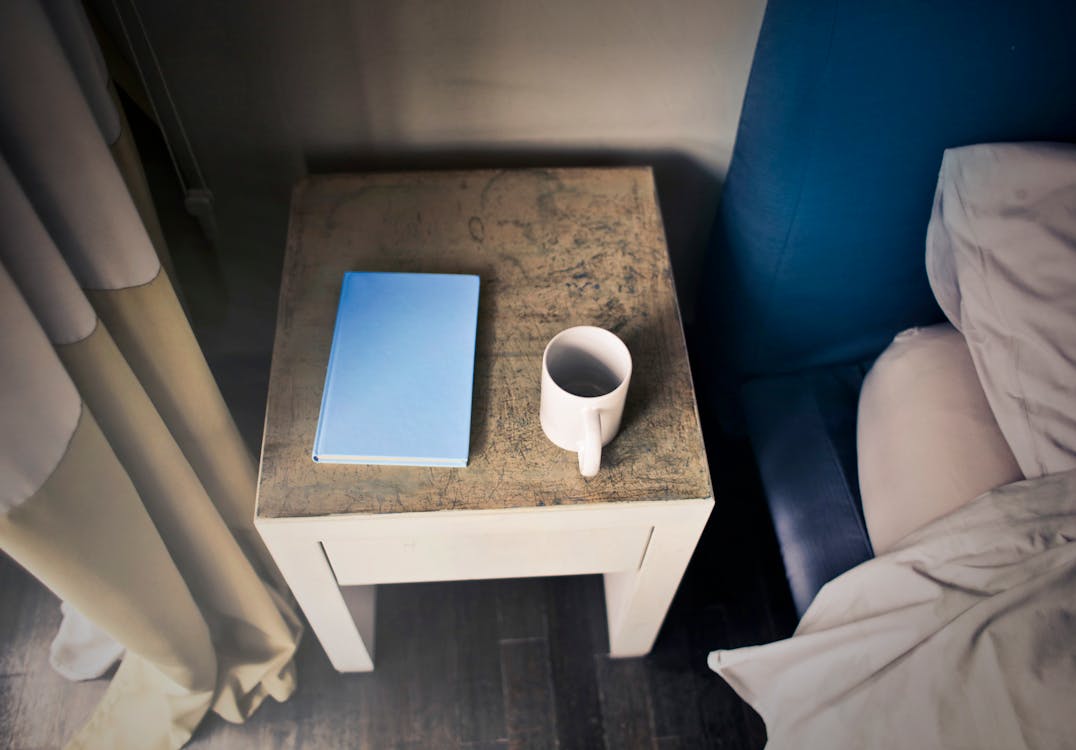 Free Photography of Side Table Near Bed Stock Photo