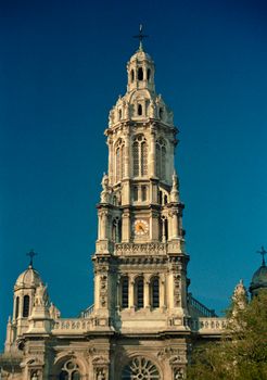 Explore the grandeur of Sainte-Trinité Church, Paris against a clear blue sky.