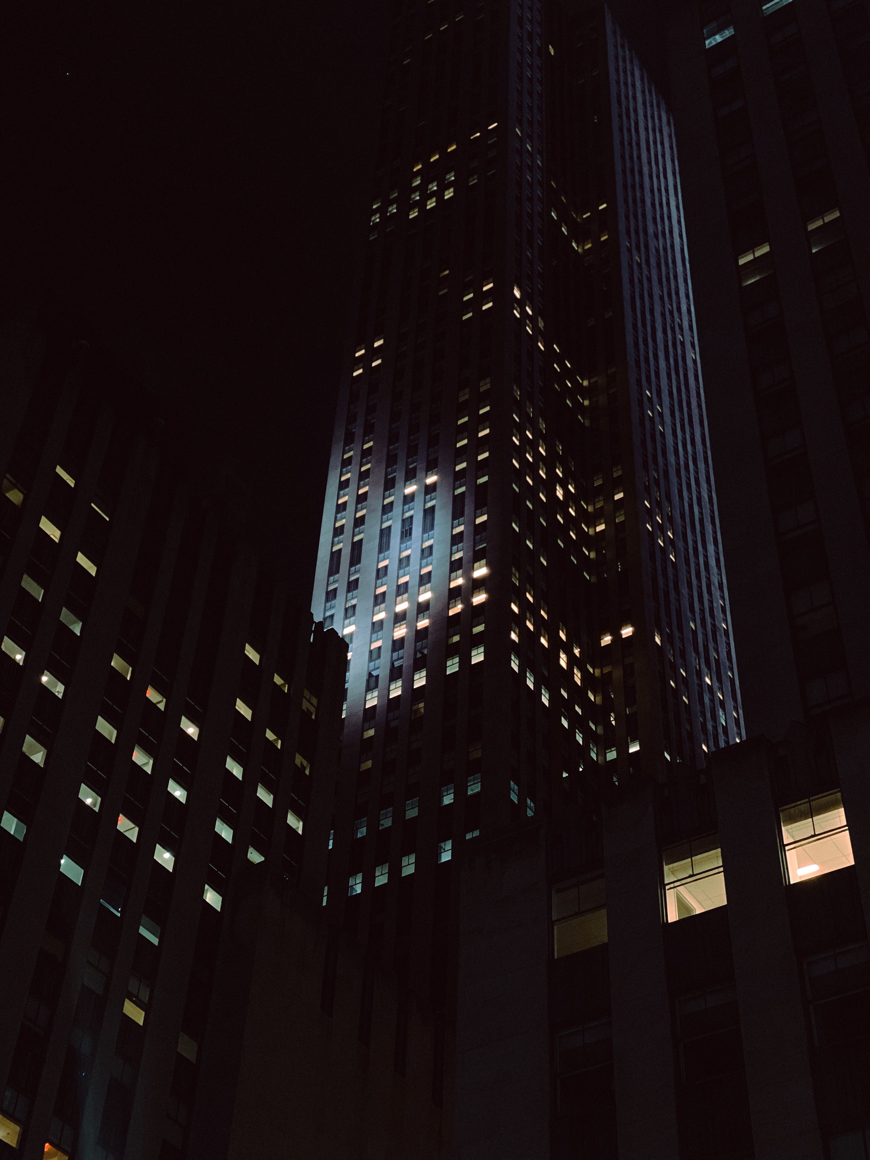 High Rise Buildings in the City at Night · Free Stock Photo