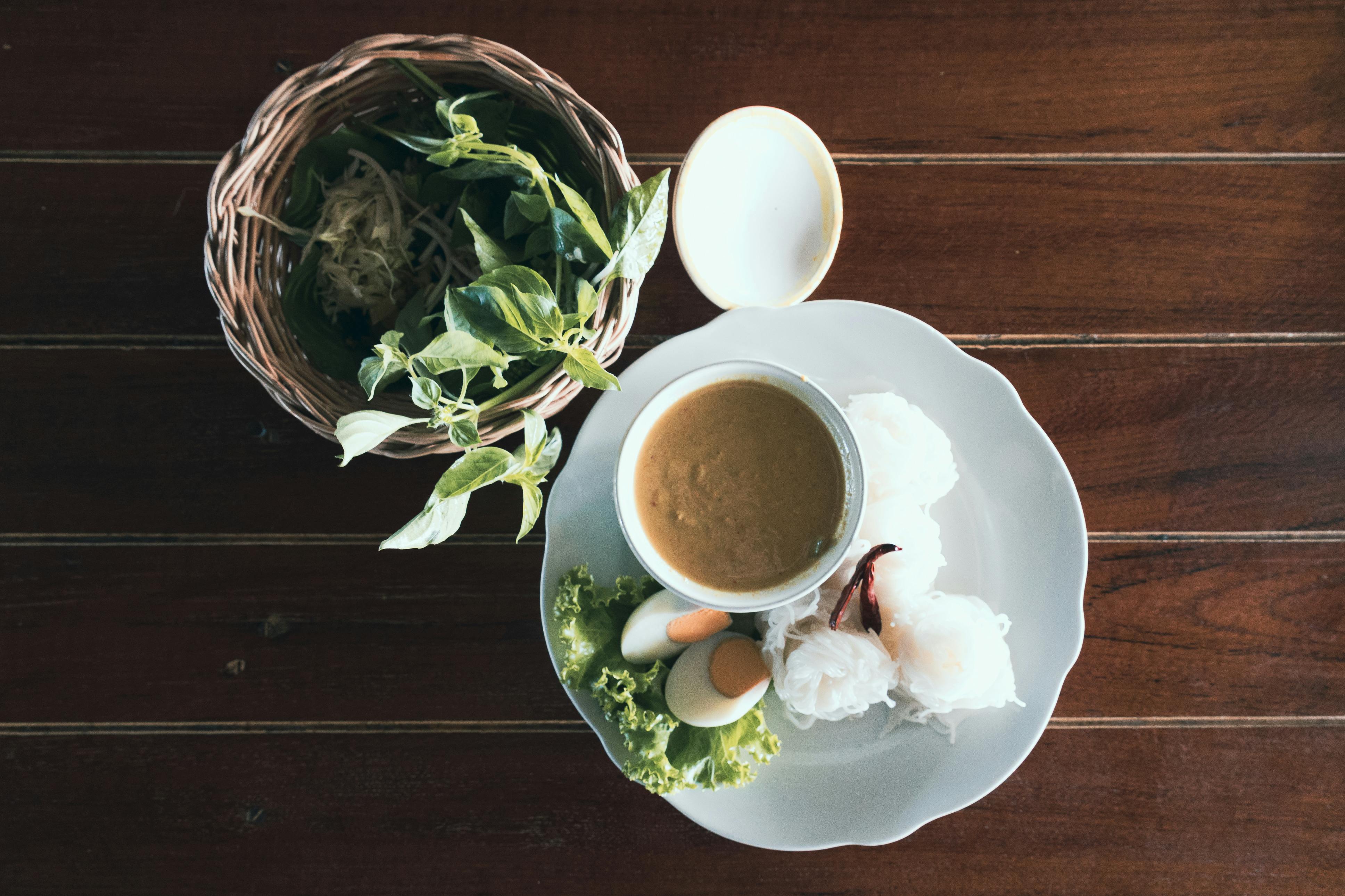 Free White Ceramic Teacup on White Ceramic Saucer Stock Photo
