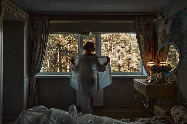 Woman Near Windows In Room