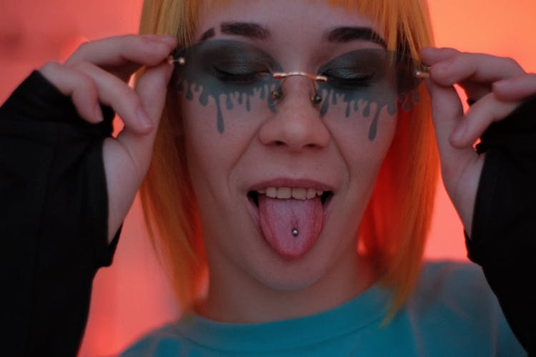 Woman With Tongue Piercing