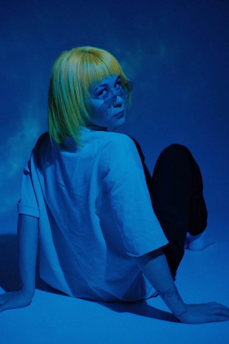 Woman With Dyed Hair And Bangs