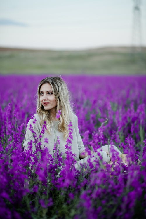  A Woman Sitting in a Lavender Field