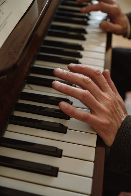 Free Hands on Piano Keys Stock Photo