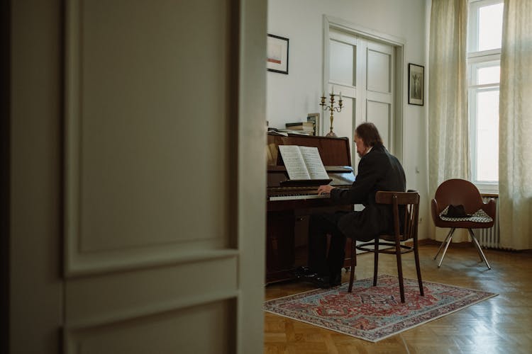 Elderly Man Playing Piano