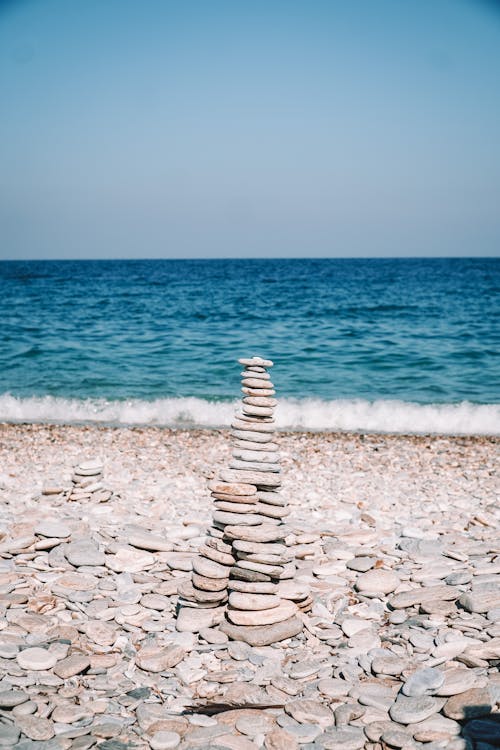 A Stack of Rocks on a Rocky Beach · Free Stock Photo