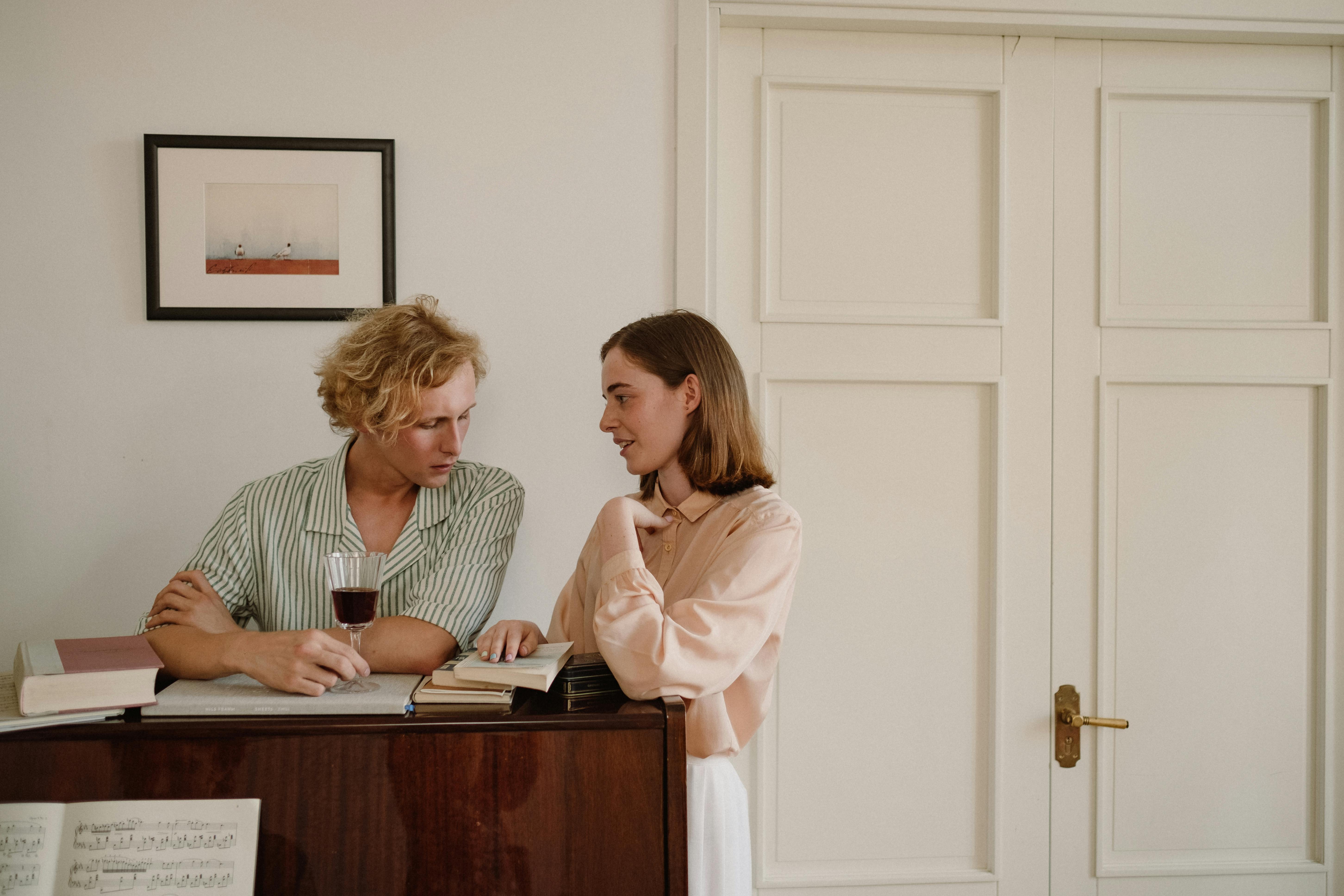 A Man and Woman Talking Together · Free Stock Photo