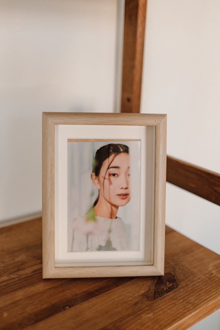 Photograph Of A Woman In Picture Frame