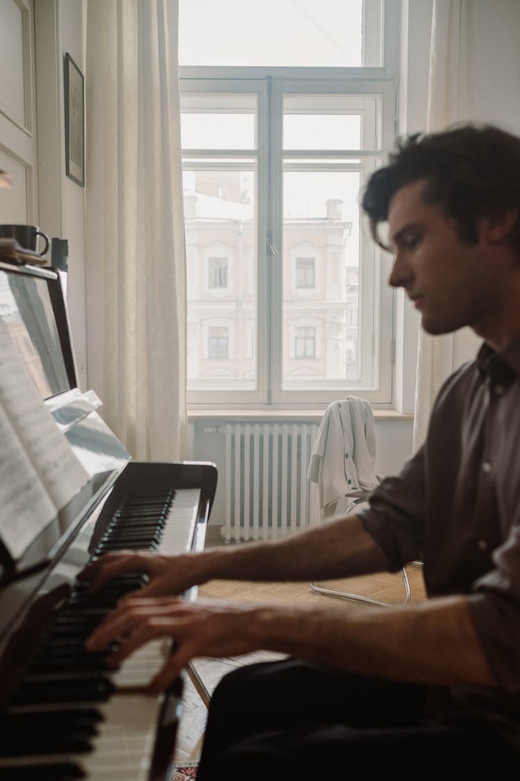 Man Playing The Piano 