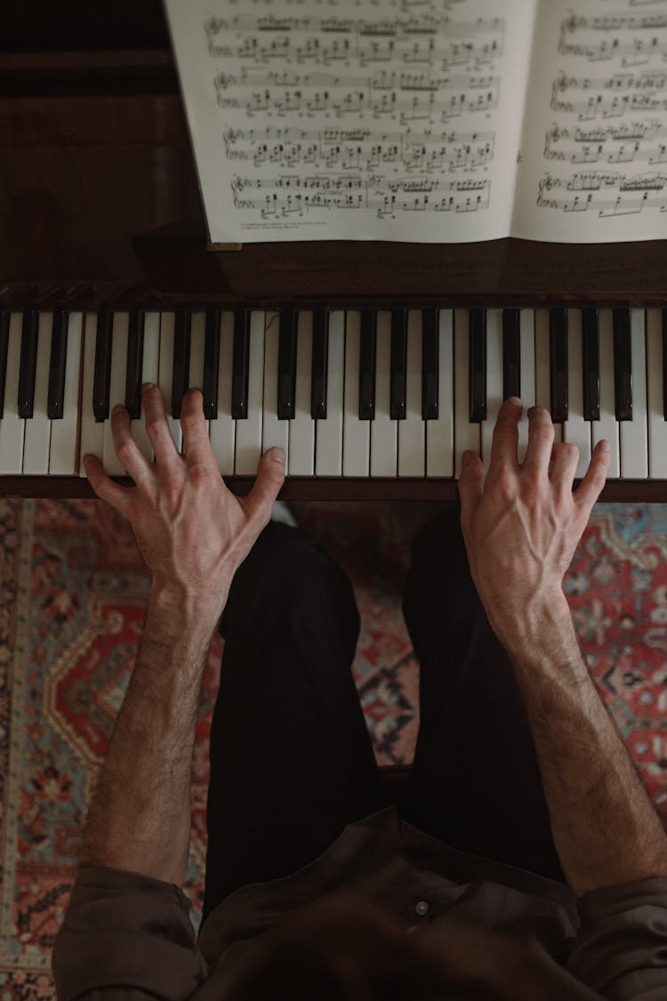 Overhead Shot Of A Person Playing The Piano