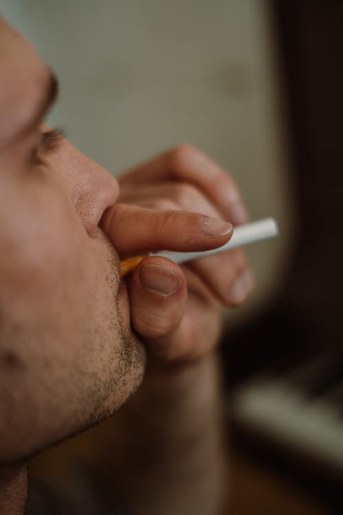 Close-up of a Man Smoking Cigarette