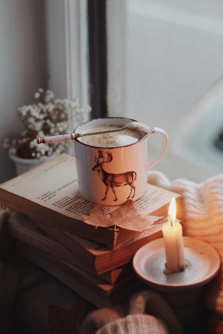 A Shot Of A Liquid In A Vintage Mug