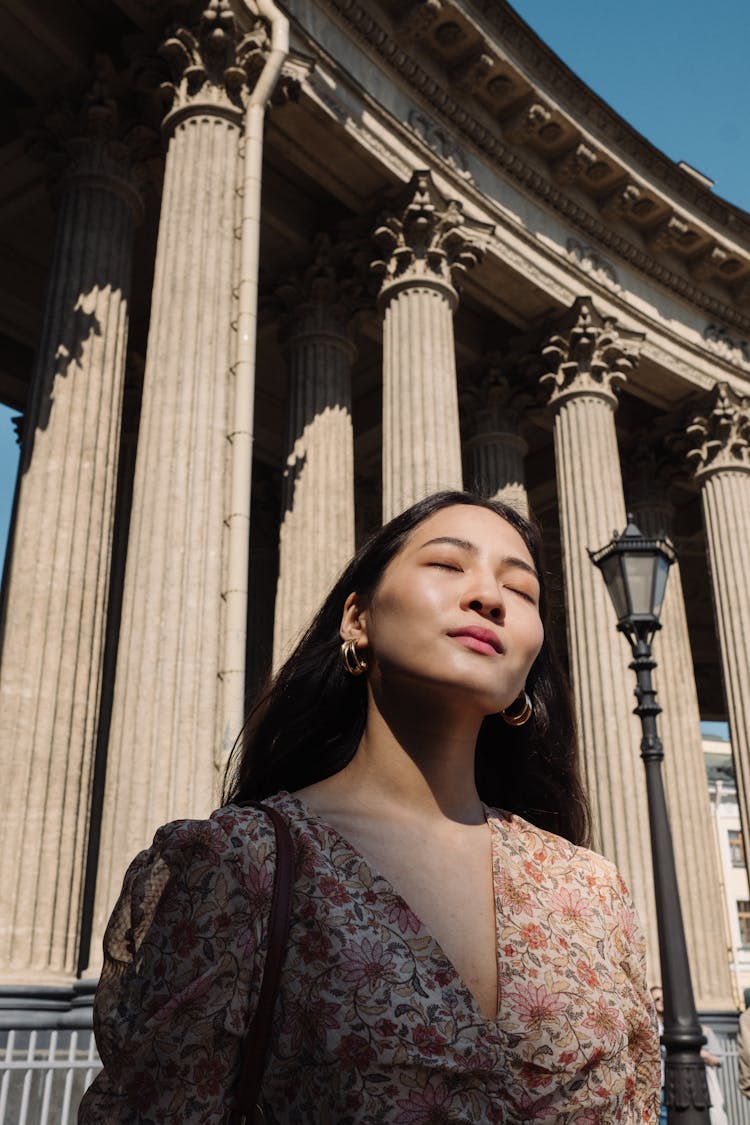 Woman Against Columns