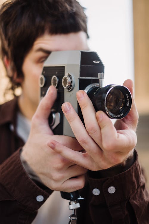 Základová fotografie zdarma na téma analogový fotoaparát, černé vlasy, detail