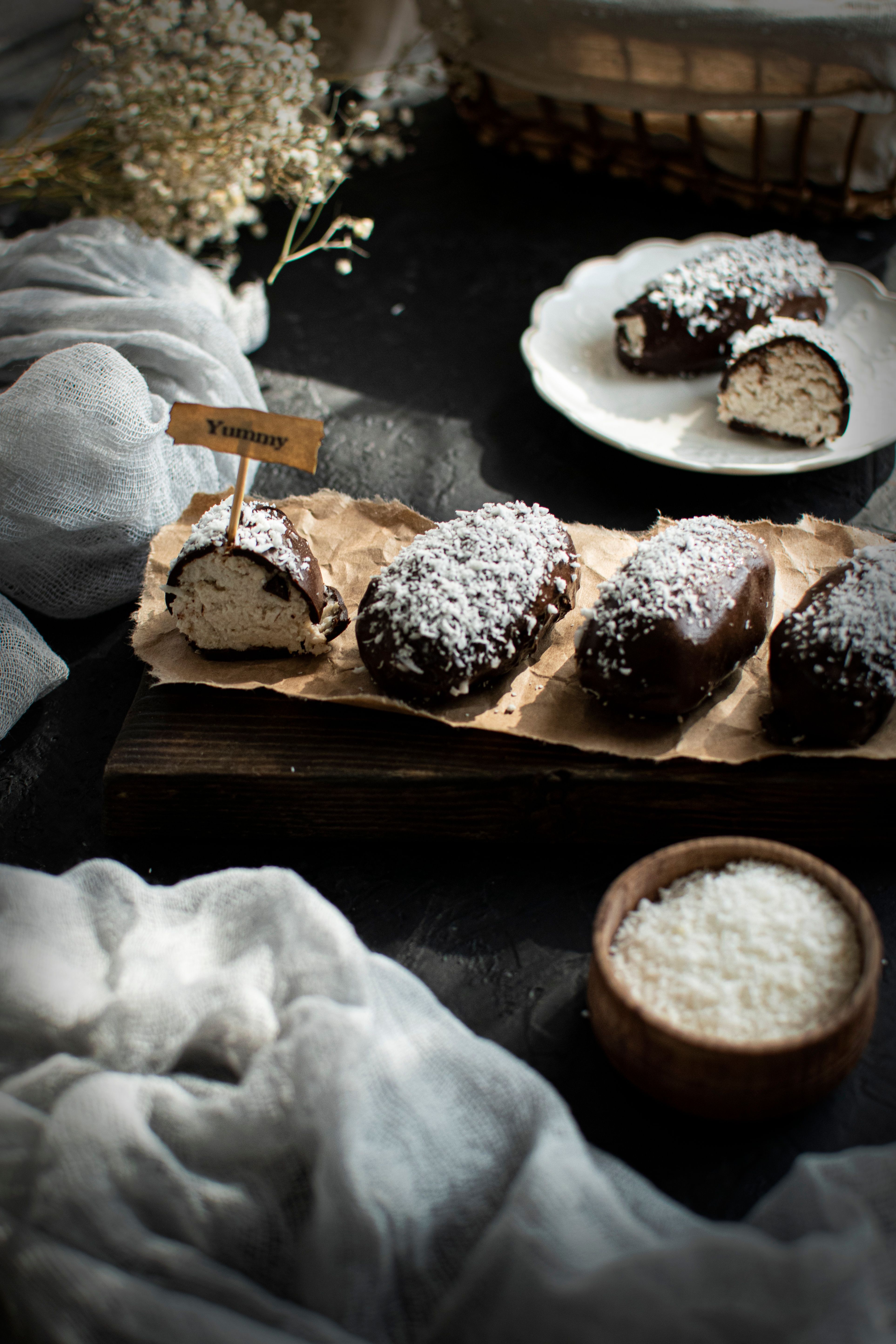 Indulge in chocolate pastries topped with coconut flakes, perfect for satisfying your sweet tooth.