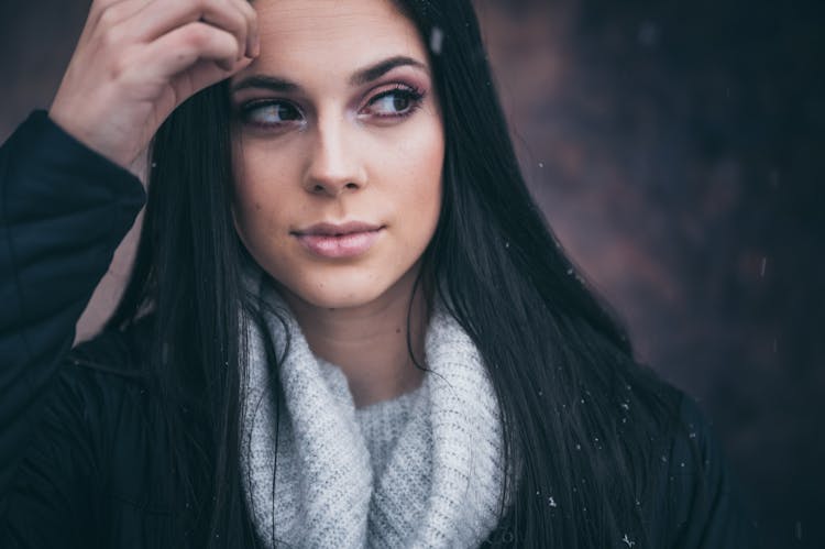 Beautiful Brunette Woman At Snowfall 