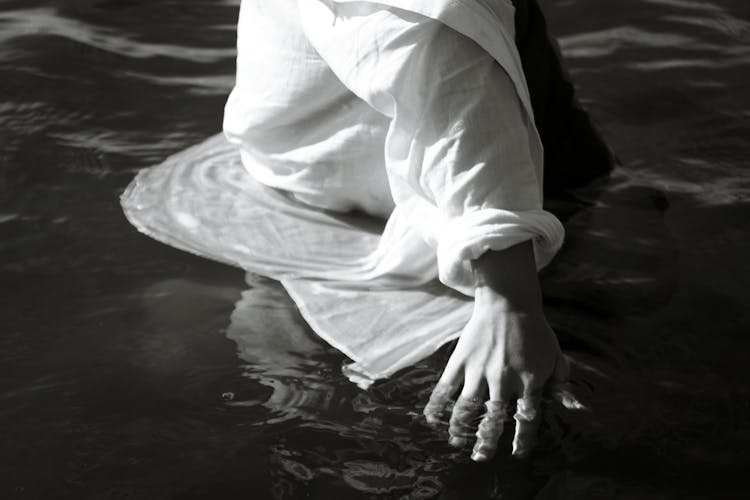 Woman Hand In Water