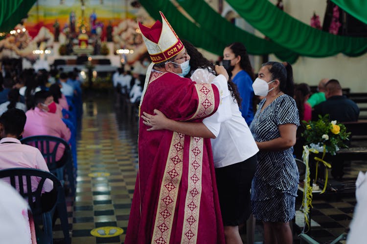 Bishop And Girl During Confirmation Ceremony