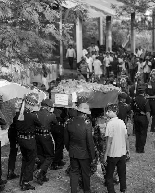 People on a Funeral in Black and White